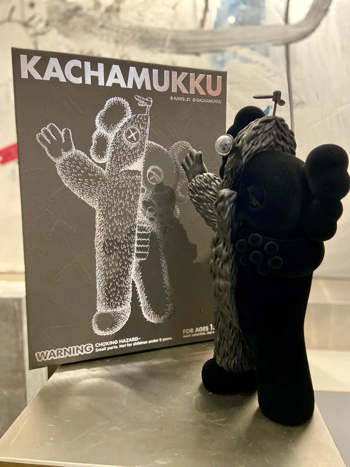Kaws Kachamukku! Black | The Arts
